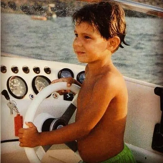 Young Rafael Nadal as a kid. Here, he took on his other love (boat riding).