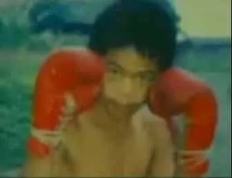 This is Manny Pacquiao as a kid, going what he loves best.