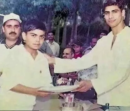 Young Virat Kohli pictured receiving an award.