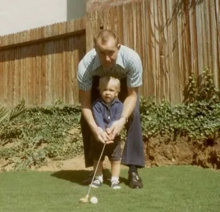 Young Phil Mickelson with his Dad.