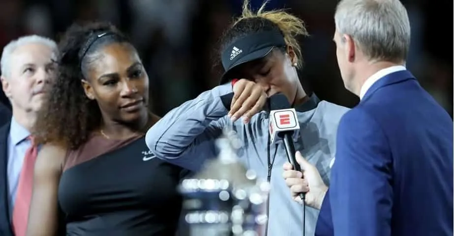 An emotional Naomi apologizes to fan for defeating her childhood idol Serena Williams.