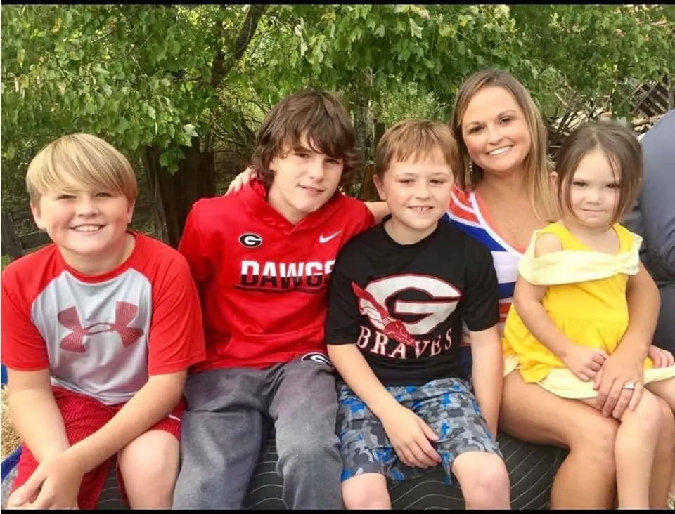 AJ Styles' wife, Wendy, with their four kids.