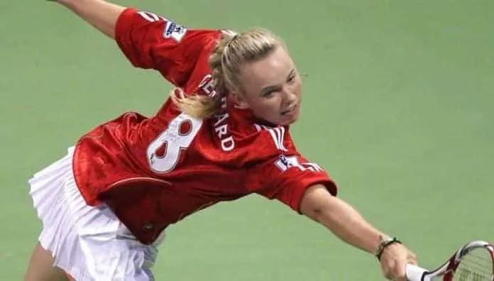 Caroline wore a Liverpool jersey to play a match during the 2011 Qatar Ladies Open.