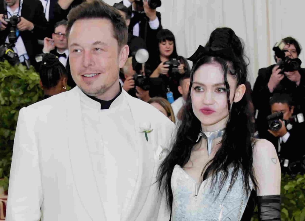 Elon Musk with girlfriend Grimes. Credits: Business Insider.