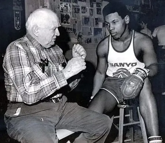 Young Tyson with his manager D'Amato.