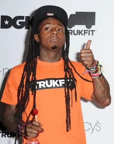 Photo of Lil Wayne at the launch of his clothing line.
