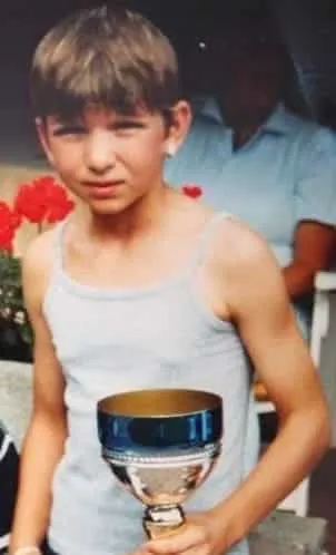 Simona Halep with a trophy from one of her junior tournaments.