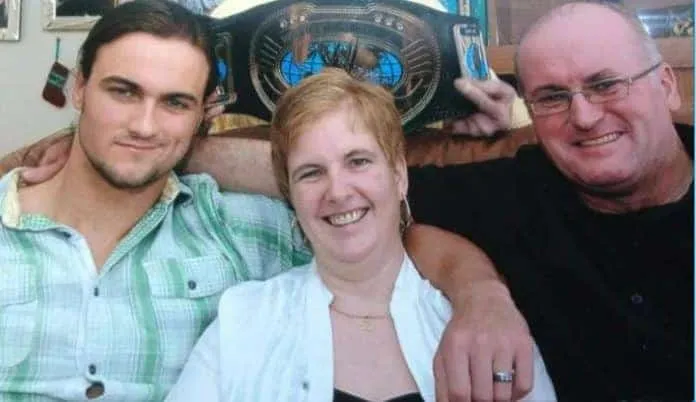 A rare photo of Drew McIntyre with his parents.