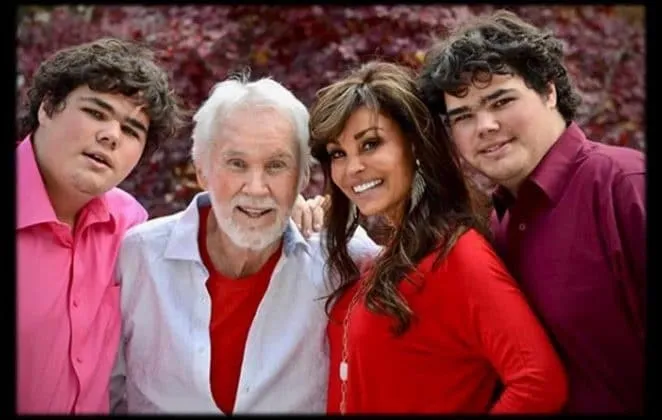 A cute photo of Kenny Rogers with his wife Wanda Miller Rogers and their twins.