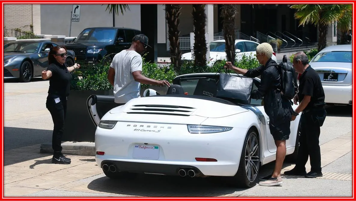 See him display his gorgeous white Porsche 911 Carrera S Cabriolet in grand style- Justjared.
