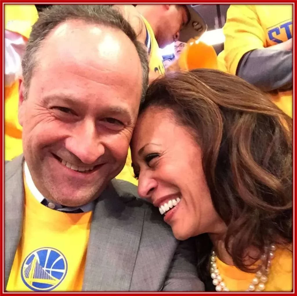 Harris and her husband attending a Golden State Warriors basketball game.