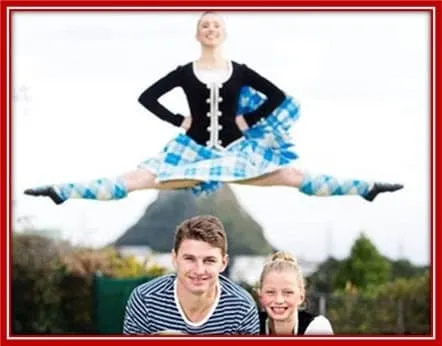 Beauden Barrett with his sister Ella at10, and highland dancing world champion Morgan Bamford.