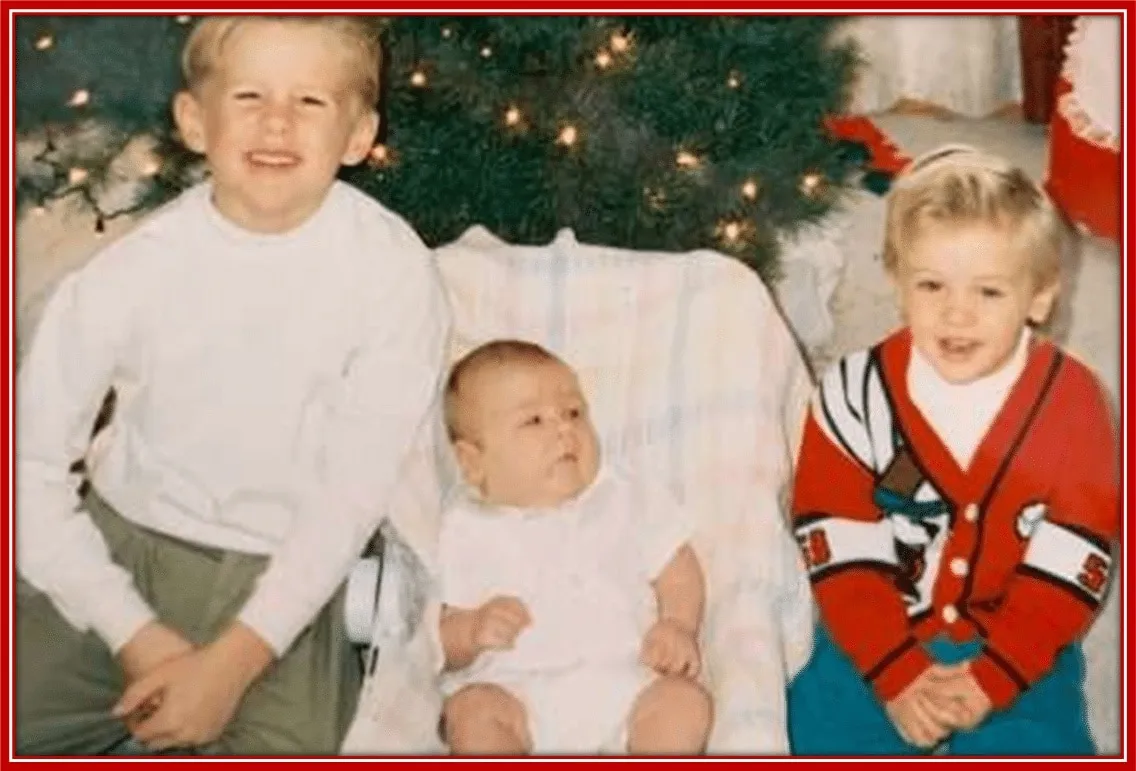 An early family photo of TJ Watt (middle) with his brothers.