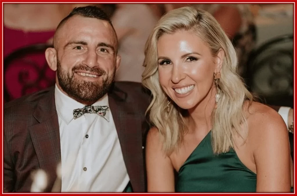 Outside the Octagon, Alex has a beautiful wife, Emma at home.