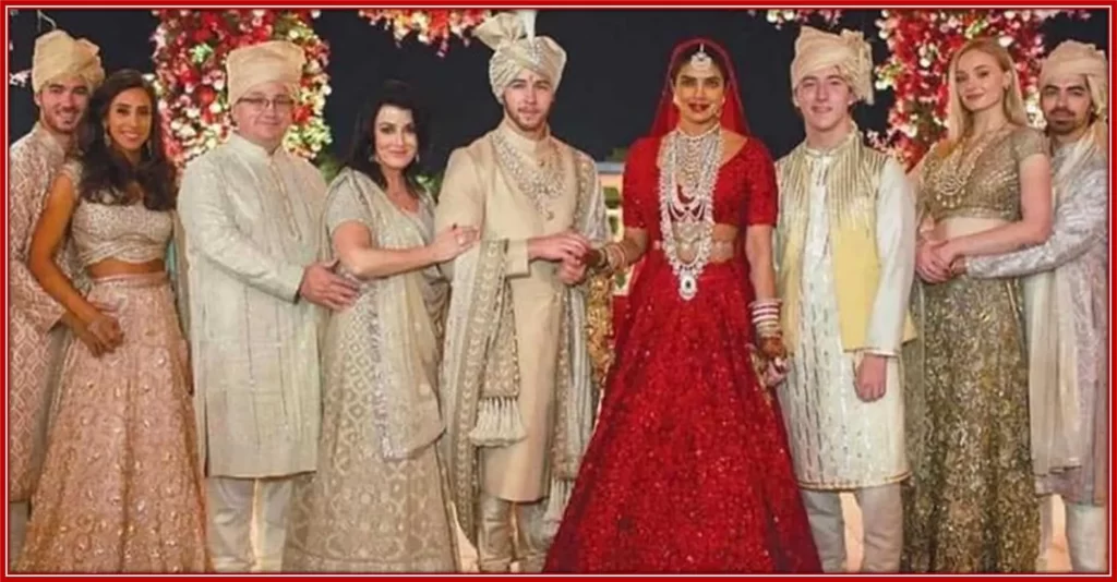 A family photo of Nick Jonas at his Indian wedding ceremony.