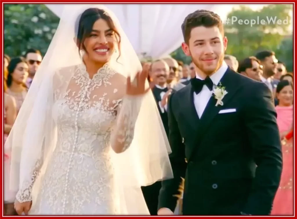 A photo of Nick with the love of his life, Chopra at their Christian wedding.
