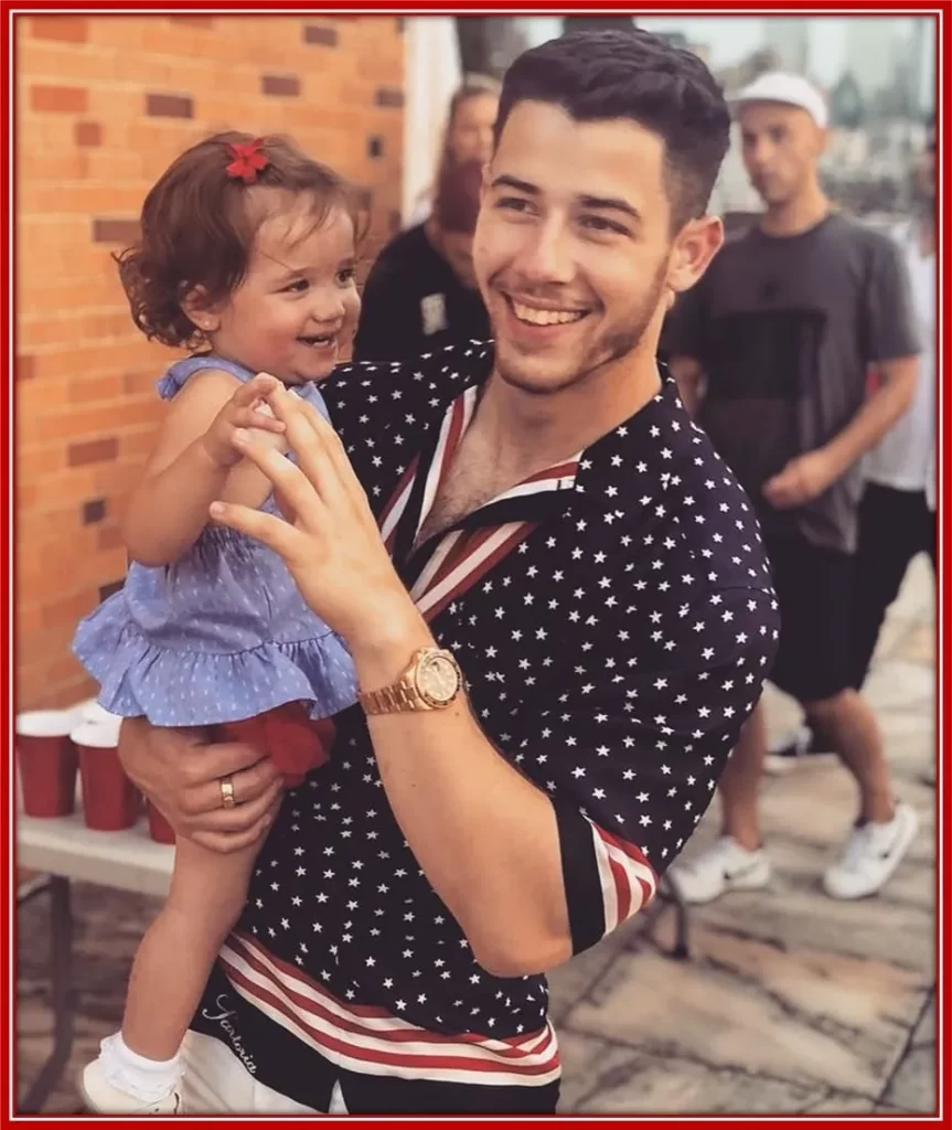 Nick Jonas with one of his Nieces, Valentina Angelina Jonas.