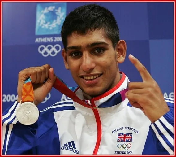 Amir Khan's meteoric rise in boxing: Beginning training at age 8, competing by 11, and later securing numerous accolades, including three English titles, ABA titles, and a cherished Olympic gold in 2003.