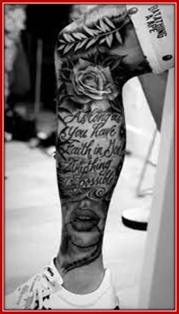 Austin Legs Tattoos That Shows his Faith in God.