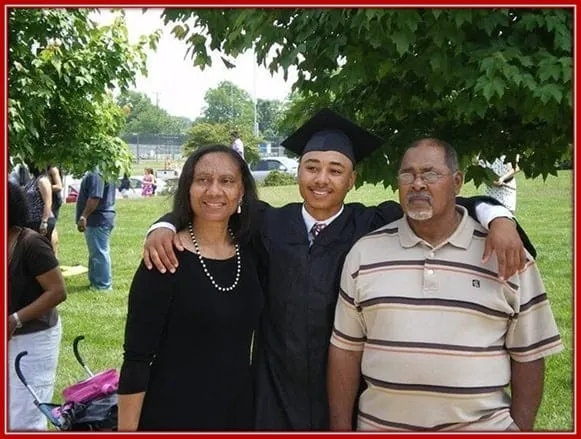 His Lovely Parents are Always Present to Share in his Joy. Together They are on his Graduation.
