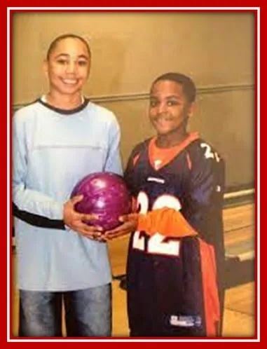 The Growing-up Days of Mookie and his Uncle Terry Shumpert Holding the Bowling Ball.