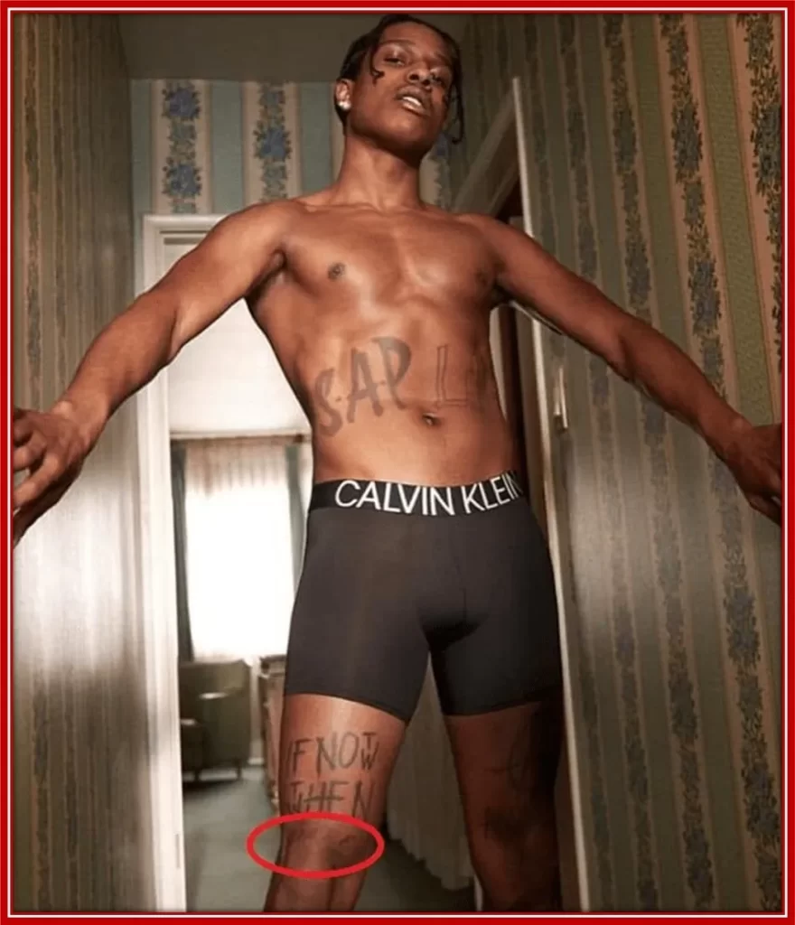 ASAP has got this Anarchy symbol tattoo on his left thigh.