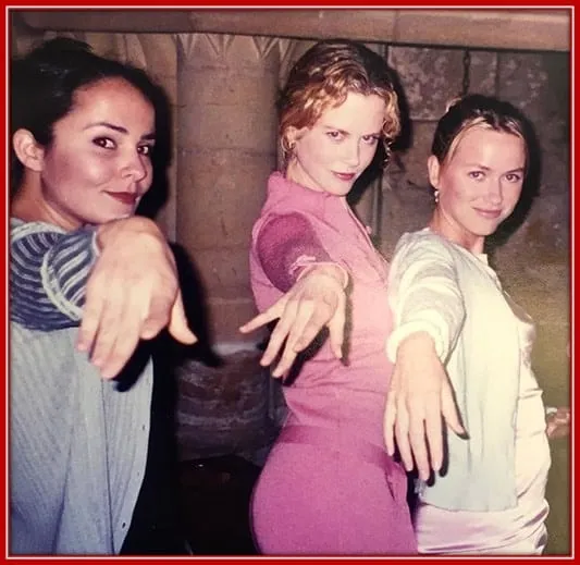 The Black and the red Hairs Sisters, Nicole and Antonia Kidman, pose with a Friend, Naomi Watts.