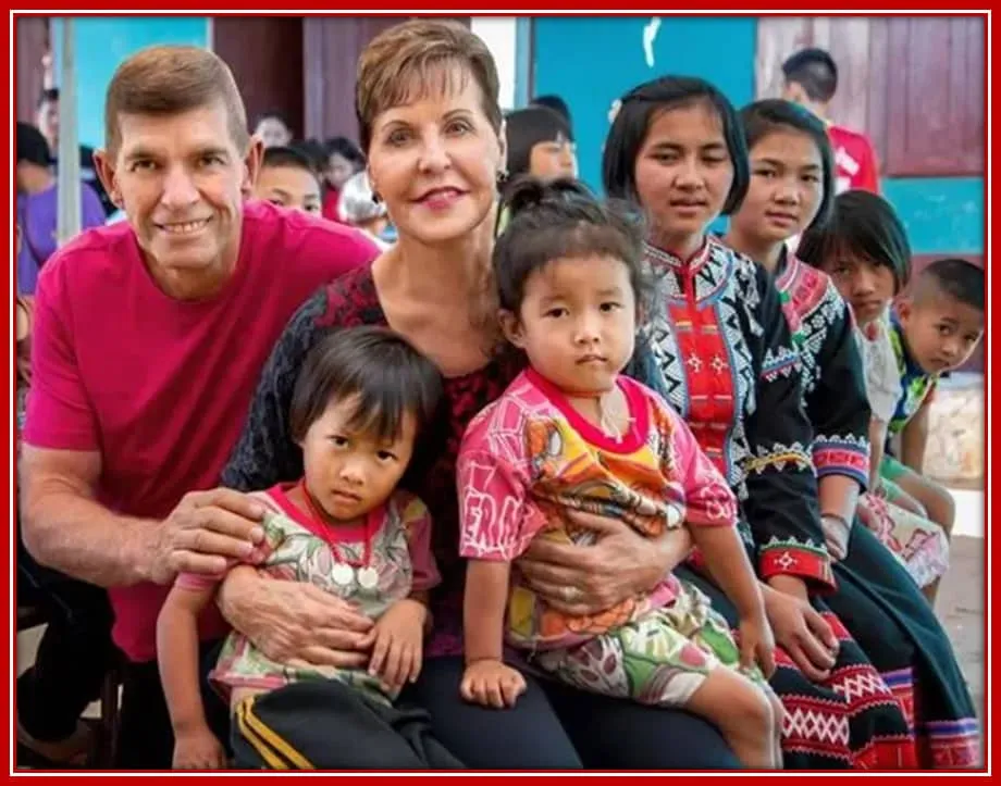 Dave and Joyce Meyer with kids from Hands of Hope outreach