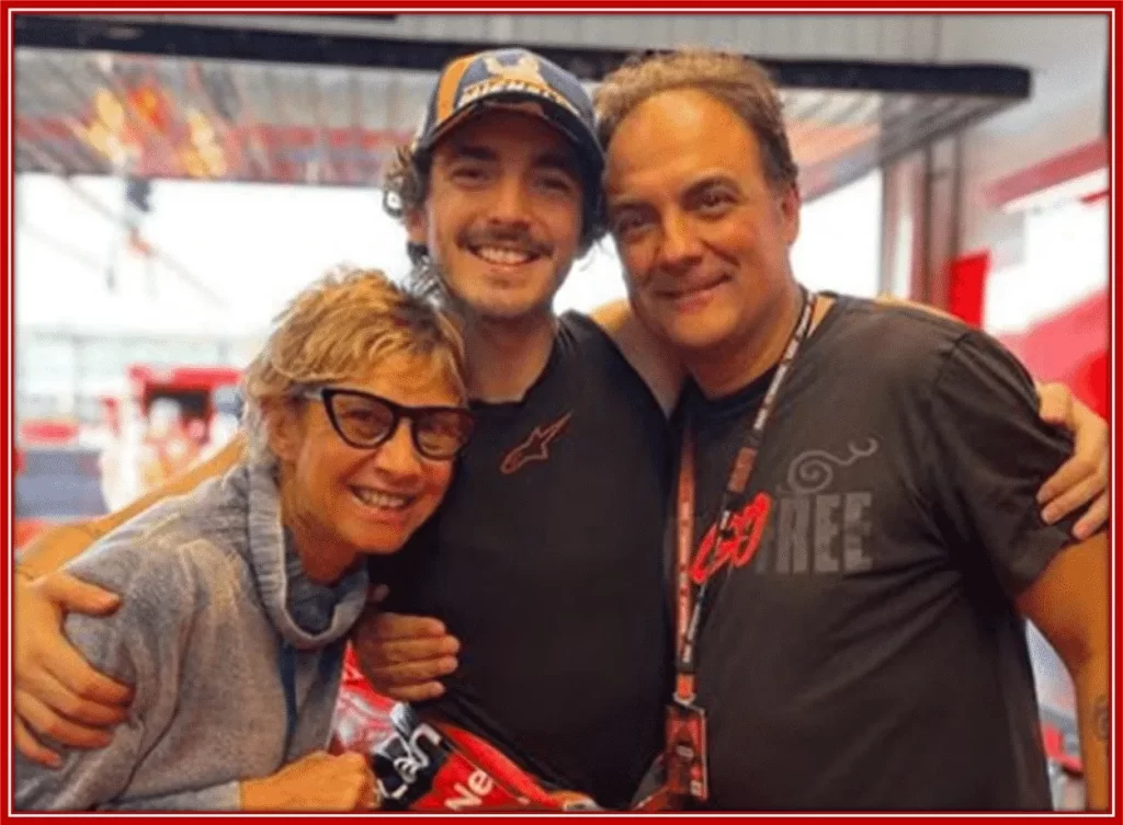 A photo of Francesco Bagnaia with his mum and dad.