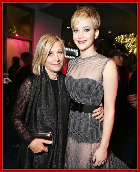 Behold Karen Lawrence, the Mother of Jennifer. Standing Beside her Daughter at a Ceremony.