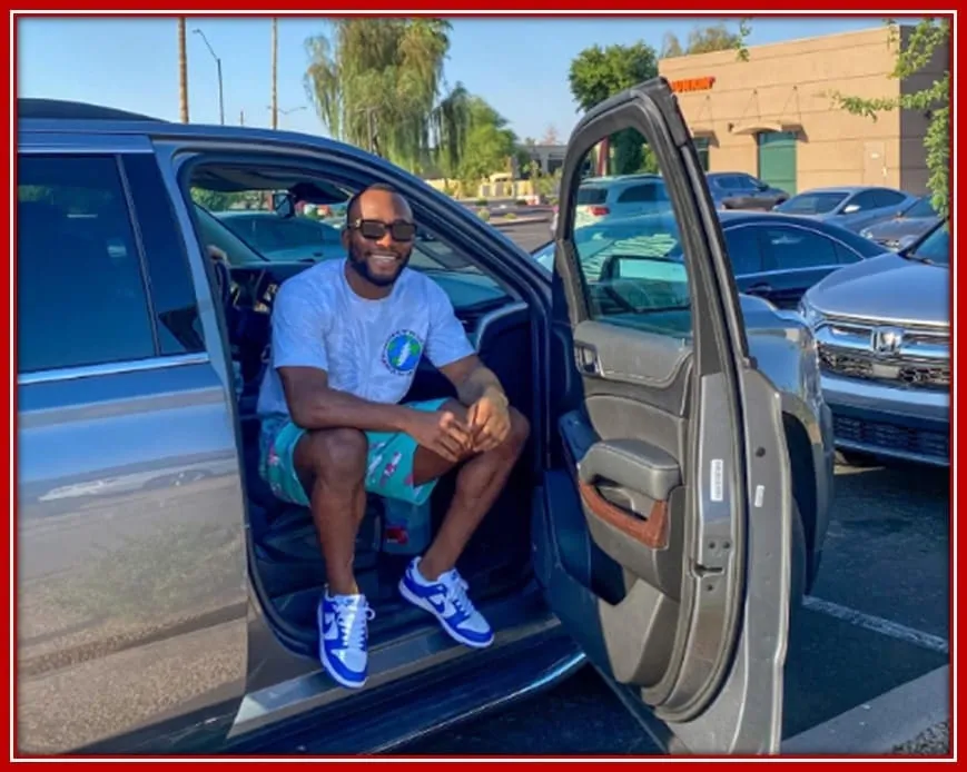 Leon Edwards in his exotic automobile