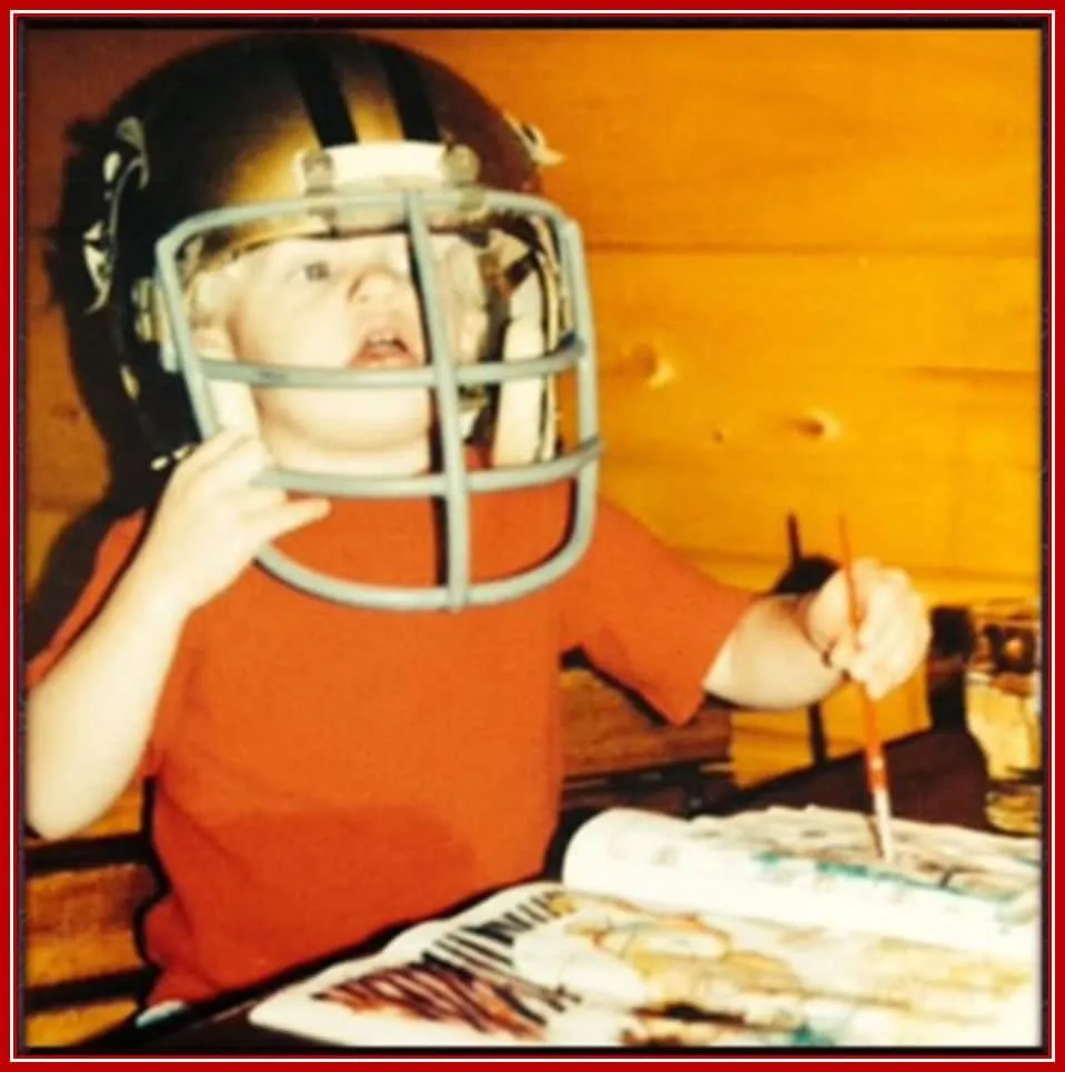 A Rare Childhood Photo of Cooper in his NFLF gear.